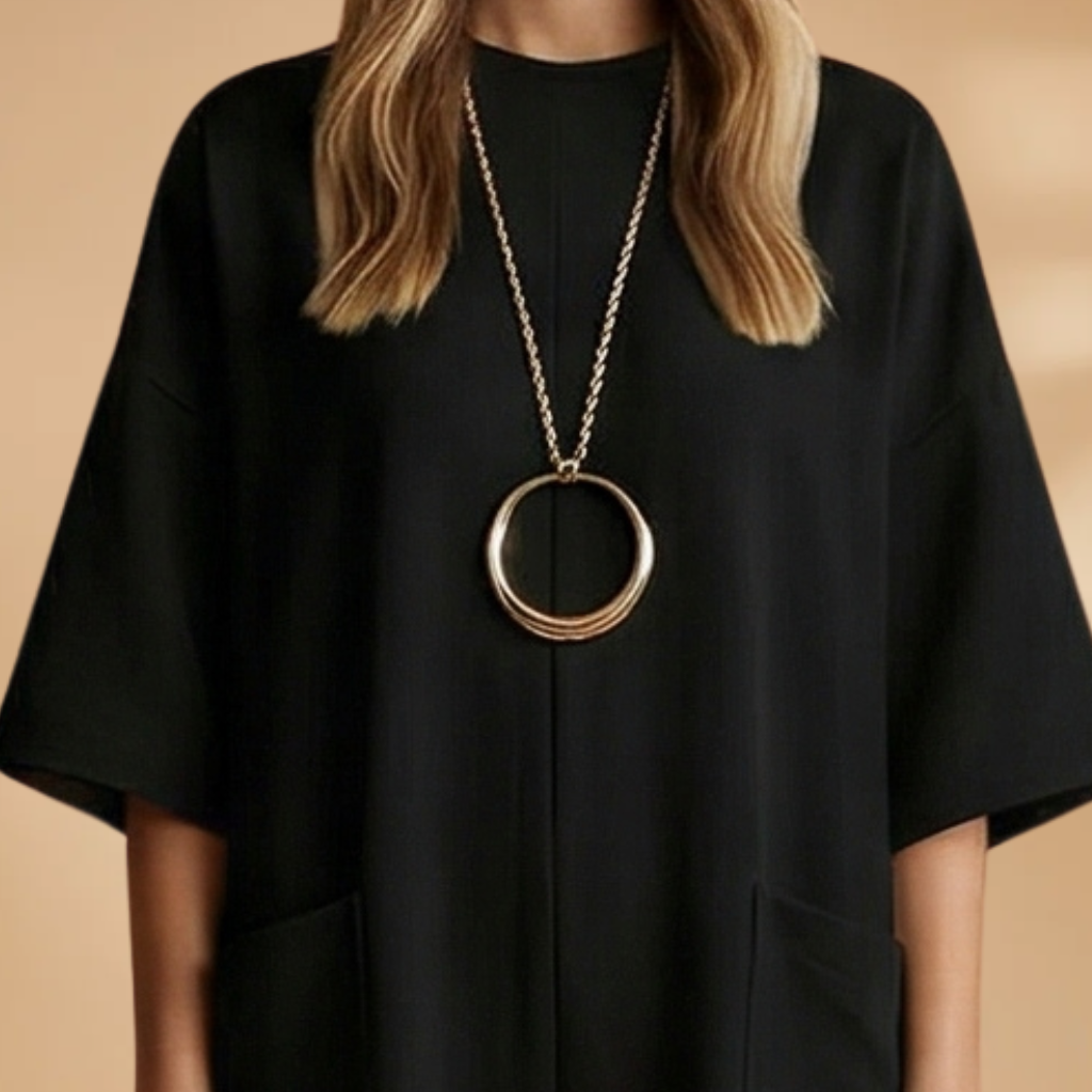 Jumpsuit with mid-length sleeves and a circular pendant for Women